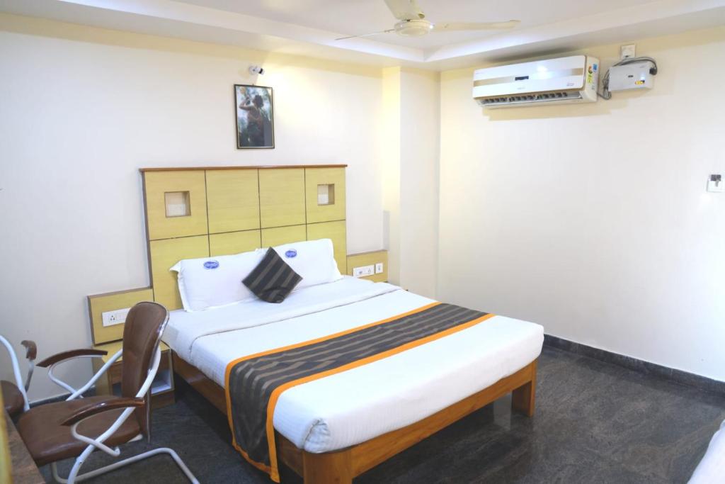 Postel nebo postele na pokoji v ubytování Hotel Way Inn Grand