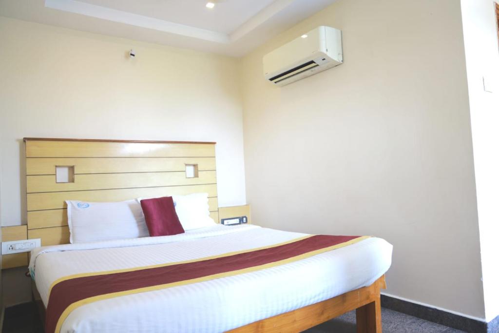 Postel nebo postele na pokoji v ubytování Hotel Way Inn Grand
