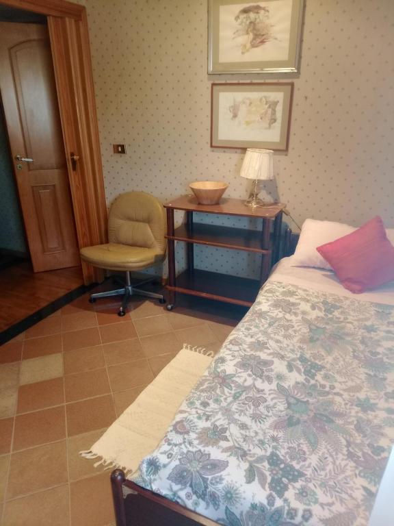 Postel nebo postele na pokoji v ubytování Casa di Luca