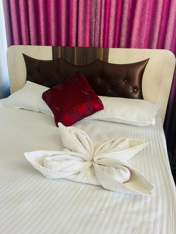 Postel nebo postele na pokoji v ubytování Hotel Mina's dreams