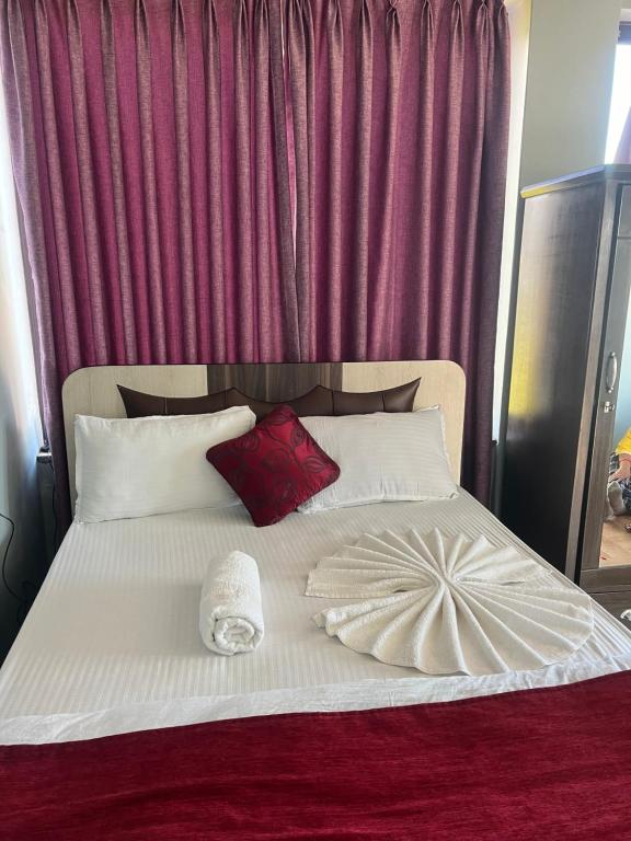 Postel nebo postele na pokoji v ubytování Hotel Mina's dreams