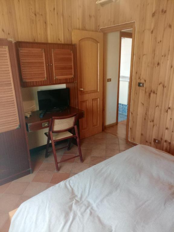 Postel nebo postele na pokoji v ubytování Casa di Luca