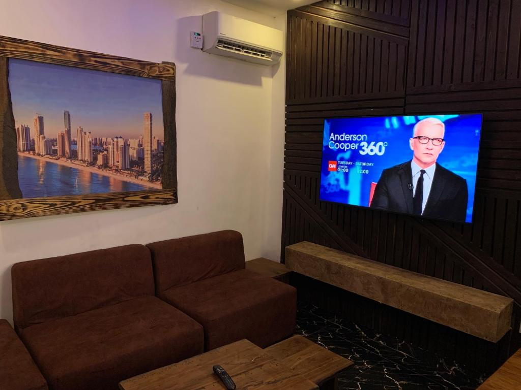 TV a/nebo společenská místnost v ubytování Presken Kuramo Waters