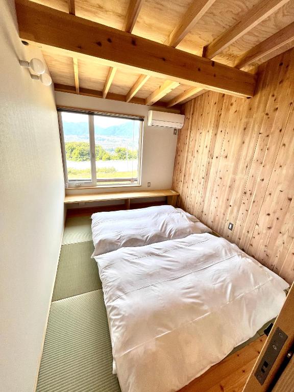 Postel nebo postele na pokoji v ubytování Cider Barn &more
