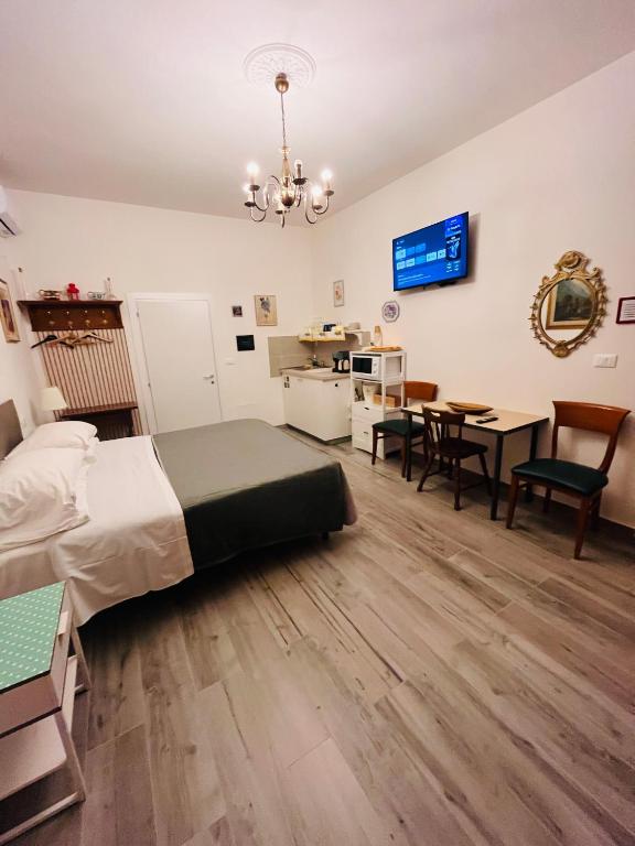 Postel nebo postele na pokoji v ubytování Pisa House