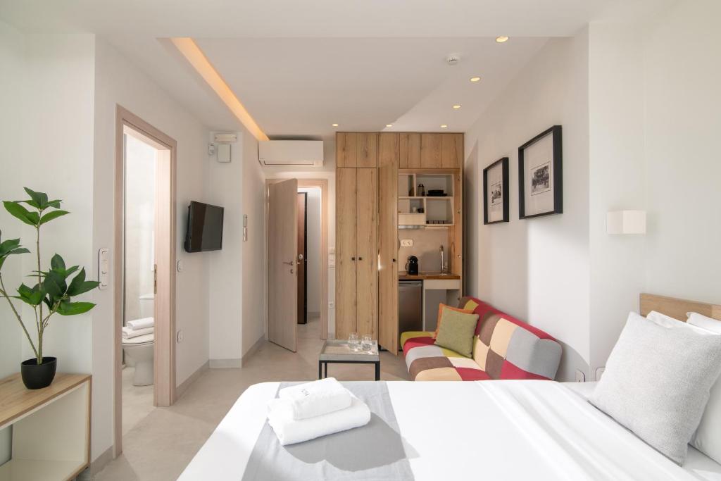 Postel nebo postele na pokoji v ubytování The Central Boutique Apartments