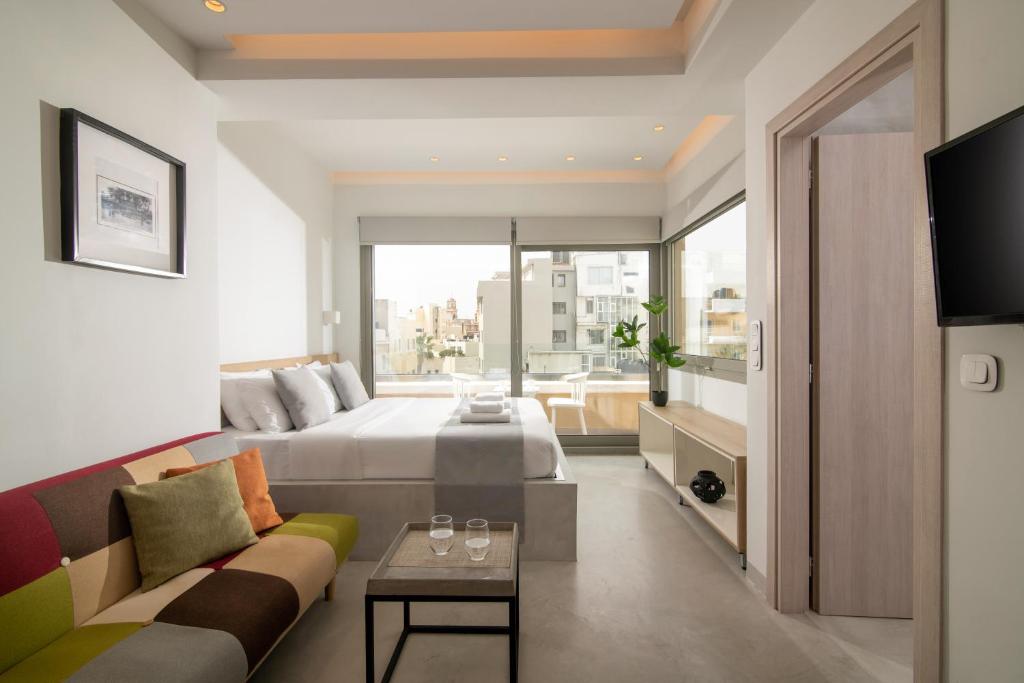 TV a/nebo společenská místnost v ubytování The Central Boutique Apartments