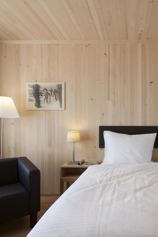 Postel nebo postele na pokoji v ubytování Hotel am Garnmarkt