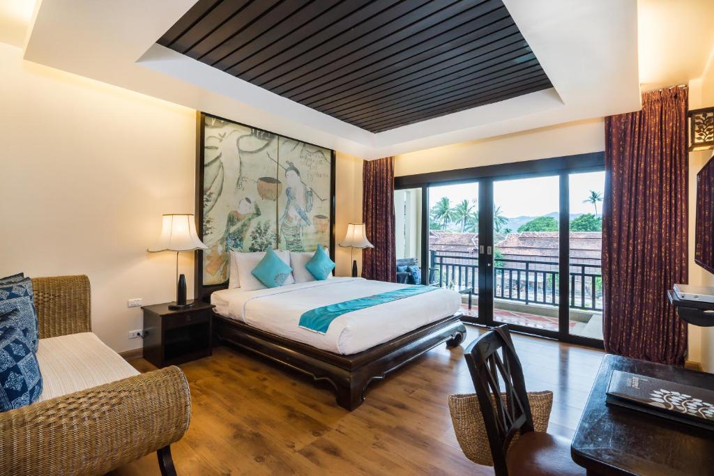 Postel nebo postele na pokoji v ubytování Dara Samui Beach Resort Adult Only