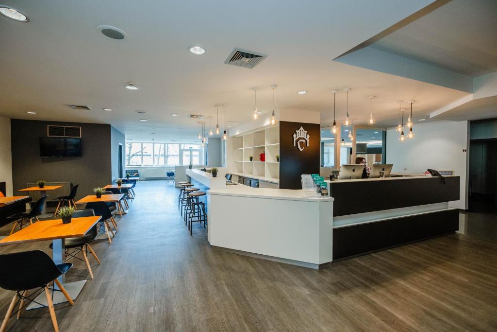Restoran või mõni muu söögikoht majutusasutuses Hotel Corsendonk Viane