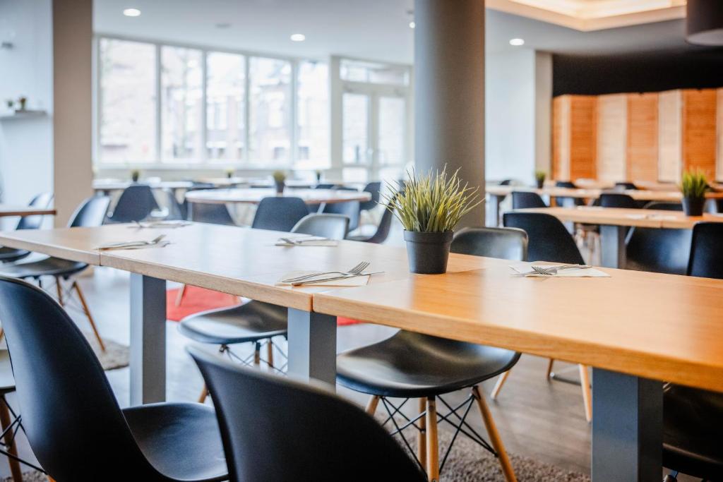 Restoran või mõni muu söögikoht majutusasutuses Hotel Corsendonk Viane