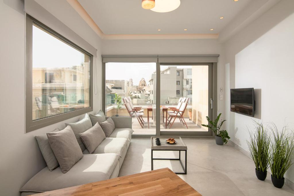 TV a/nebo společenská místnost v ubytování The Central Boutique Apartments