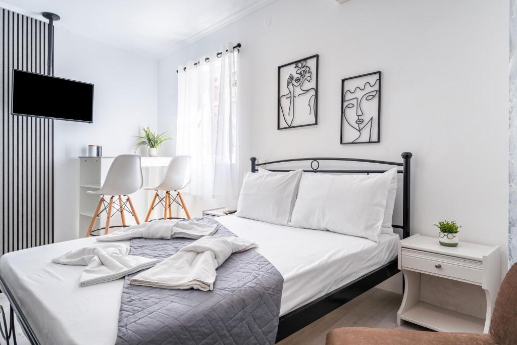 Giường trong phòng chung tại Utopia Central Studio