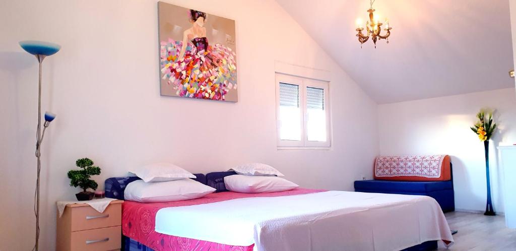 Posteľ alebo postele v izbe v ubytovaní Apartments Slavica Trogir