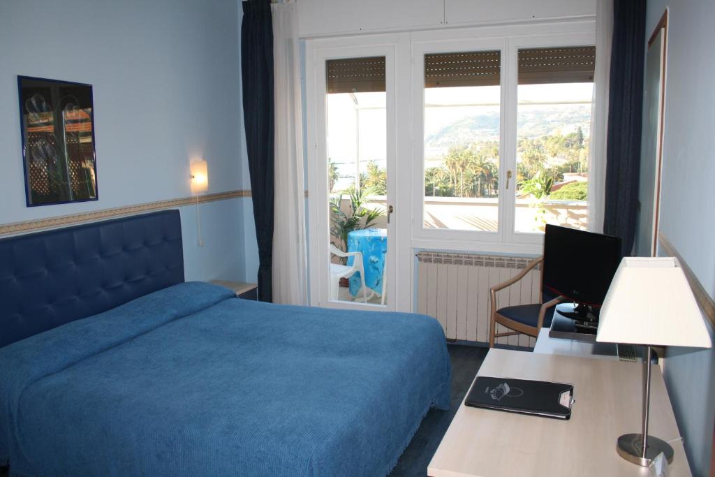 Postel nebo postele na pokoji v ubytování Hotel Sole Mare
