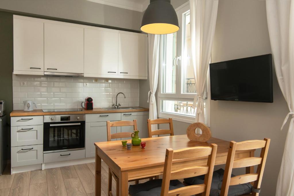 Kuchyň nebo kuchyňský kout v ubytování The Central Boutique Apartments