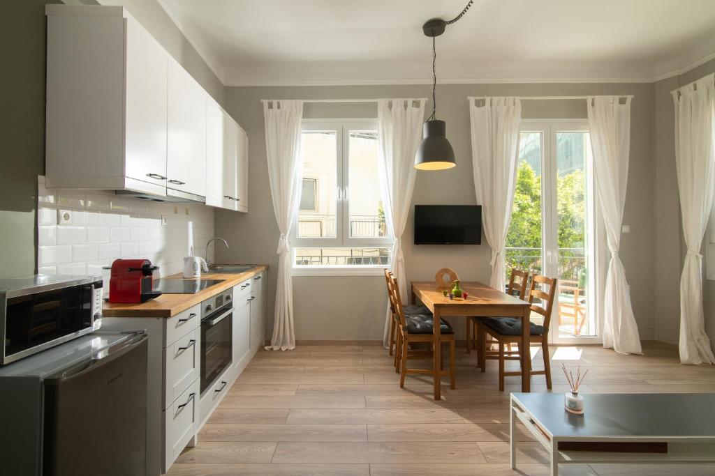 Kuchyň nebo kuchyňský kout v ubytování The Central Boutique Apartments