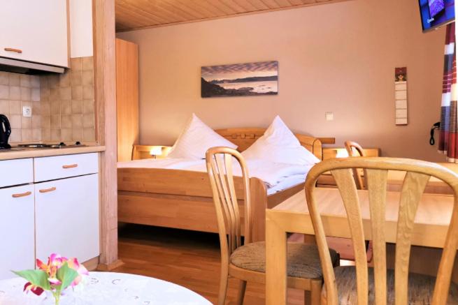 Kuchyň nebo kuchyňský kout v ubytování Hotel Ursula Garni