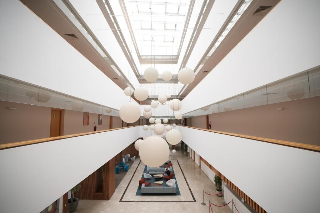 an overhead view of a hospital hallway with a large ceiling at Zephyr Agadir in Agadir