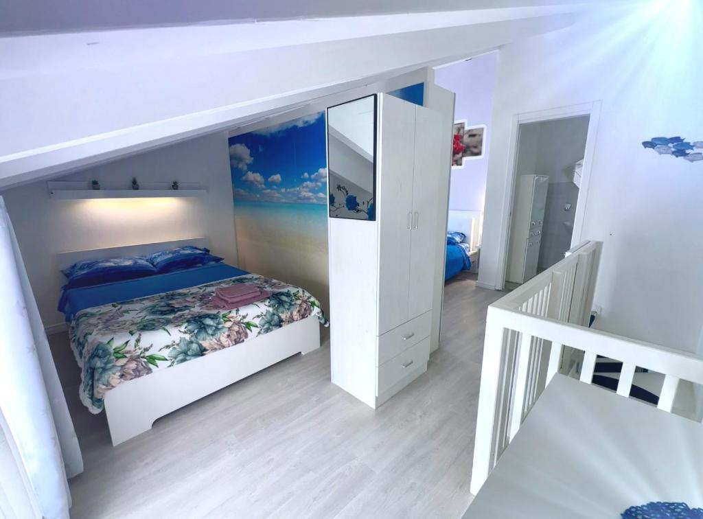 Postel nebo postele na pokoji v ubytování Alloggio Ulivi