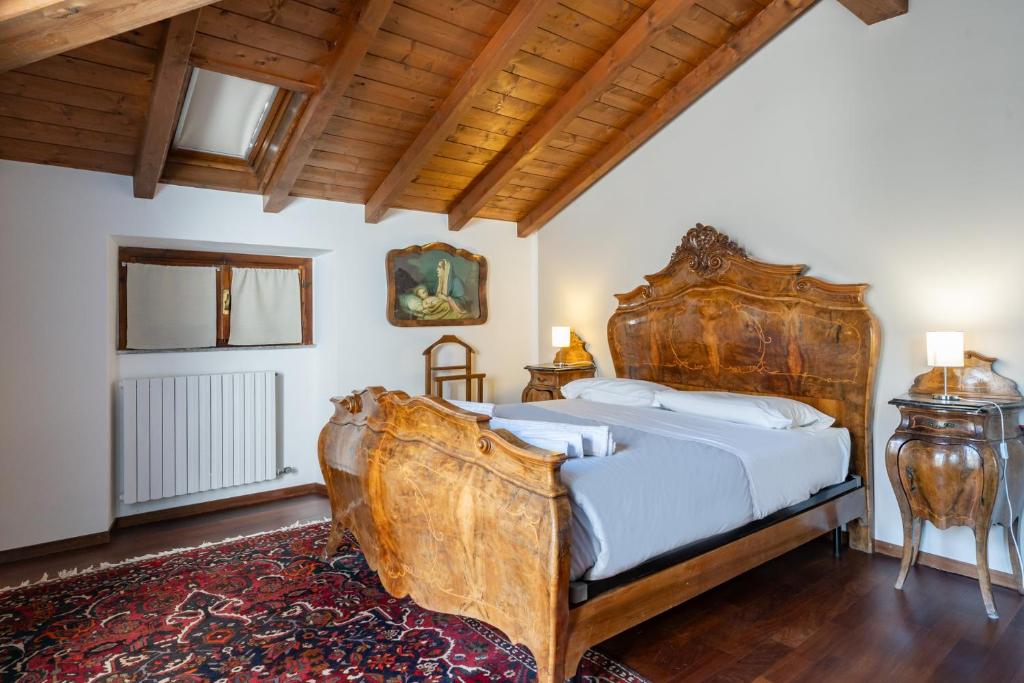 Postel nebo postele na pokoji v ubytování Luxury Apartment between Como Lake and Valsassina
