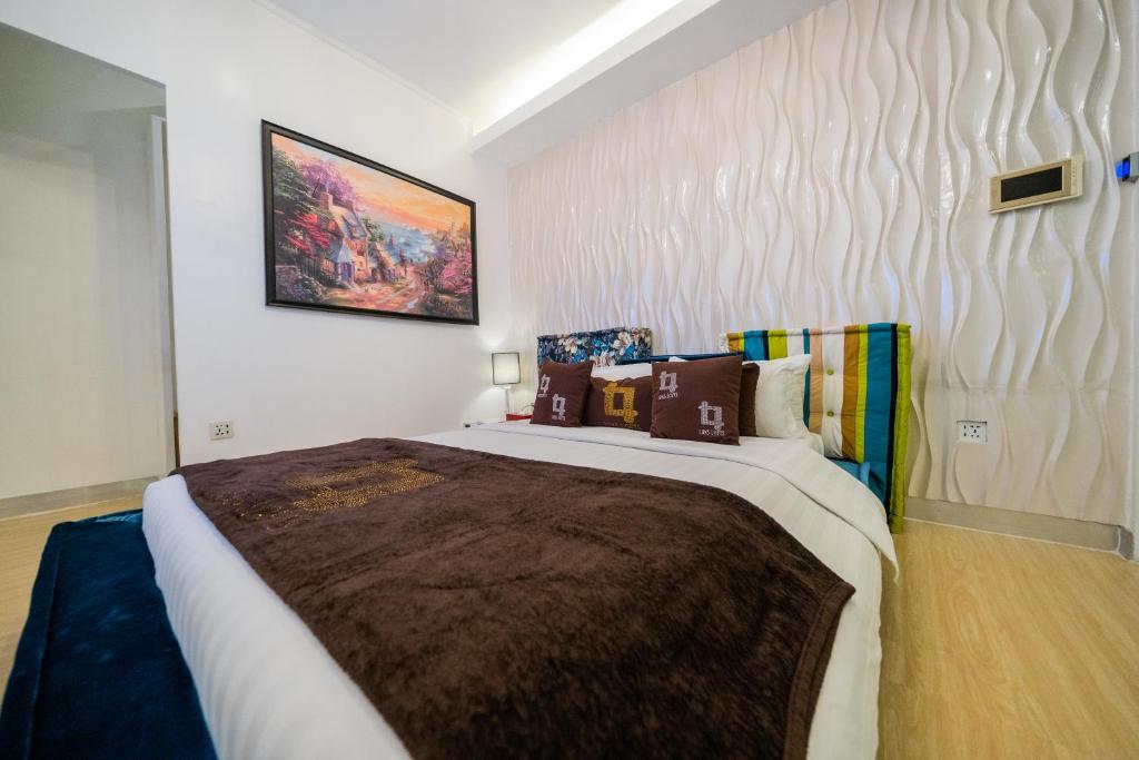 Postel nebo postele na pokoji v ubytování Luks Lofts Hotel & Residences