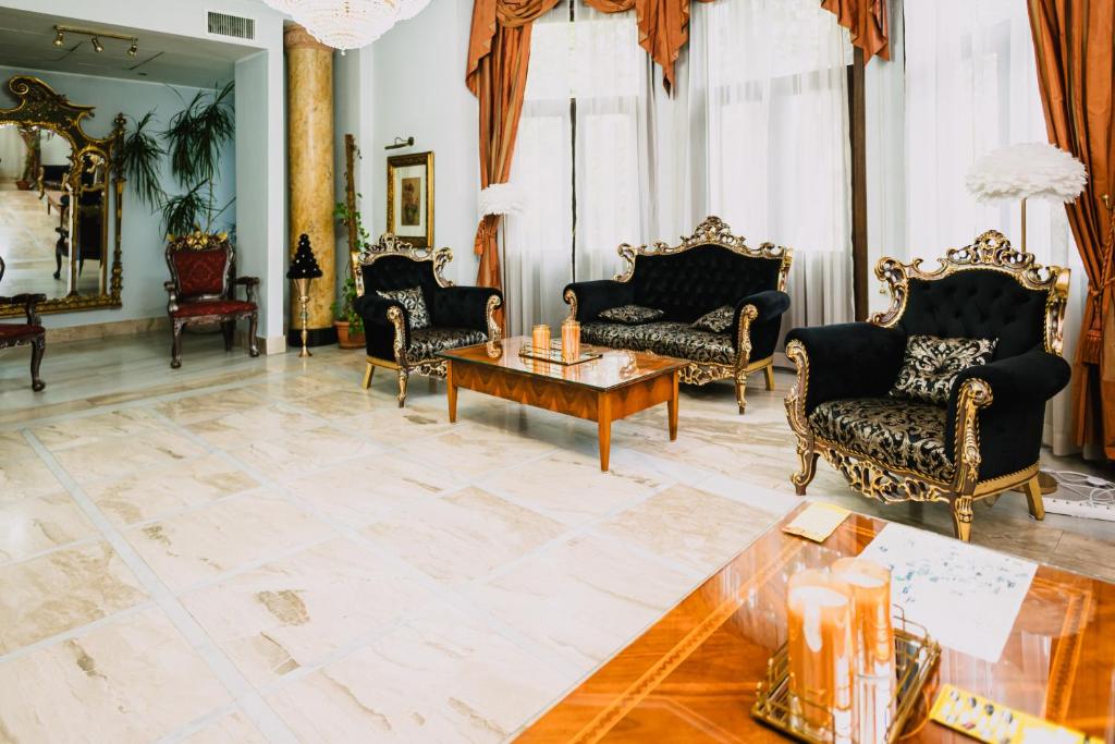 Posezení v ubytování Vigo Hotel