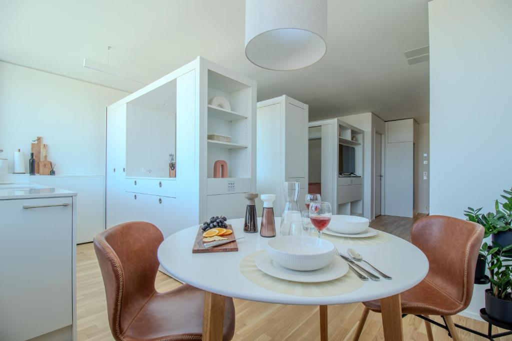 Kuchyň nebo kuchyňský kout v ubytování Löwe Apartments am Rheinfall