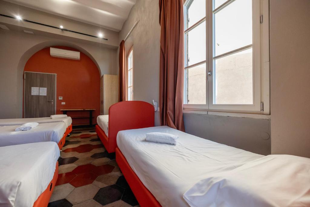 Postel nebo postele na pokoji v ubytování Borgo Ripa Urban Travel