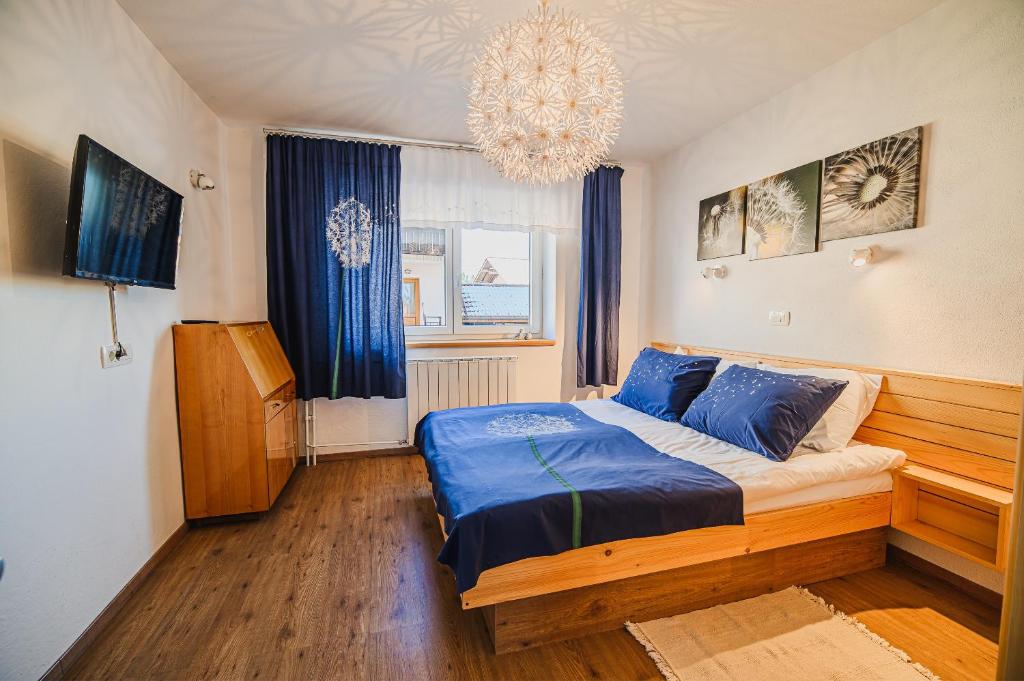 Postel nebo postele na pokoji v ubytování Apartment House Ančkin kot