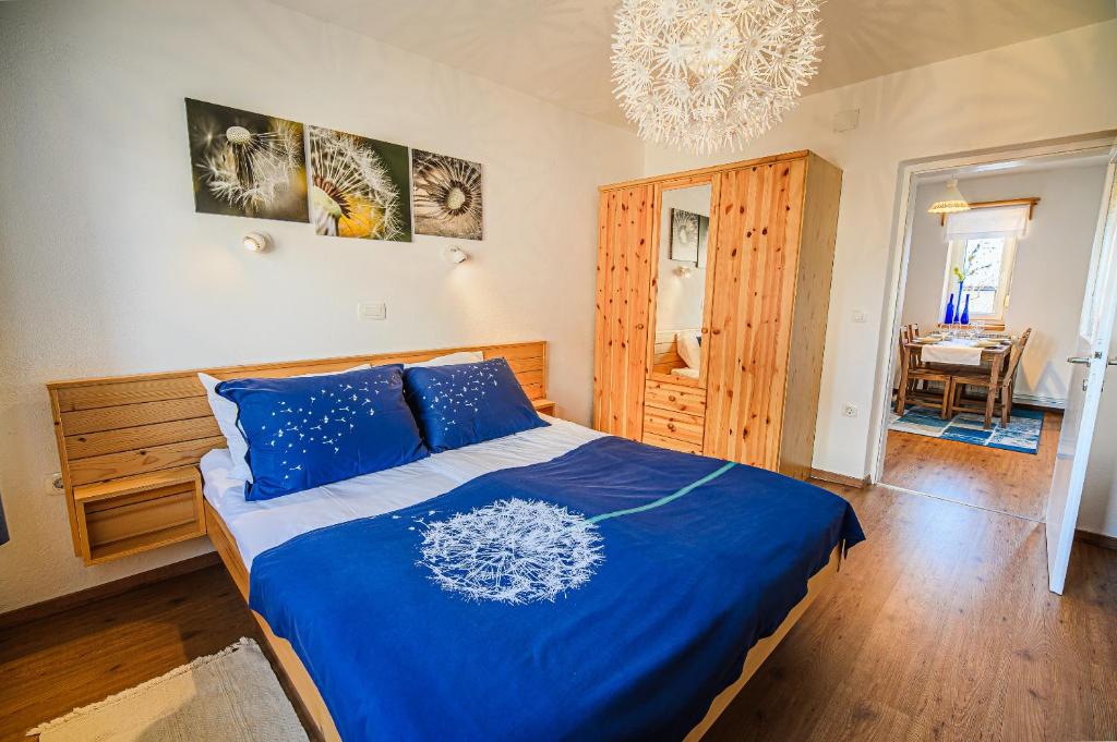 Postel nebo postele na pokoji v ubytování Apartment House Ančkin kot