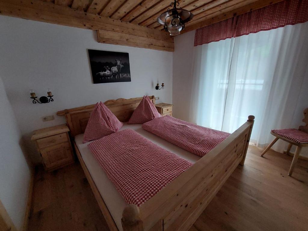 Posteľ alebo postele v izbe v ubytovaní Almstube Fritz