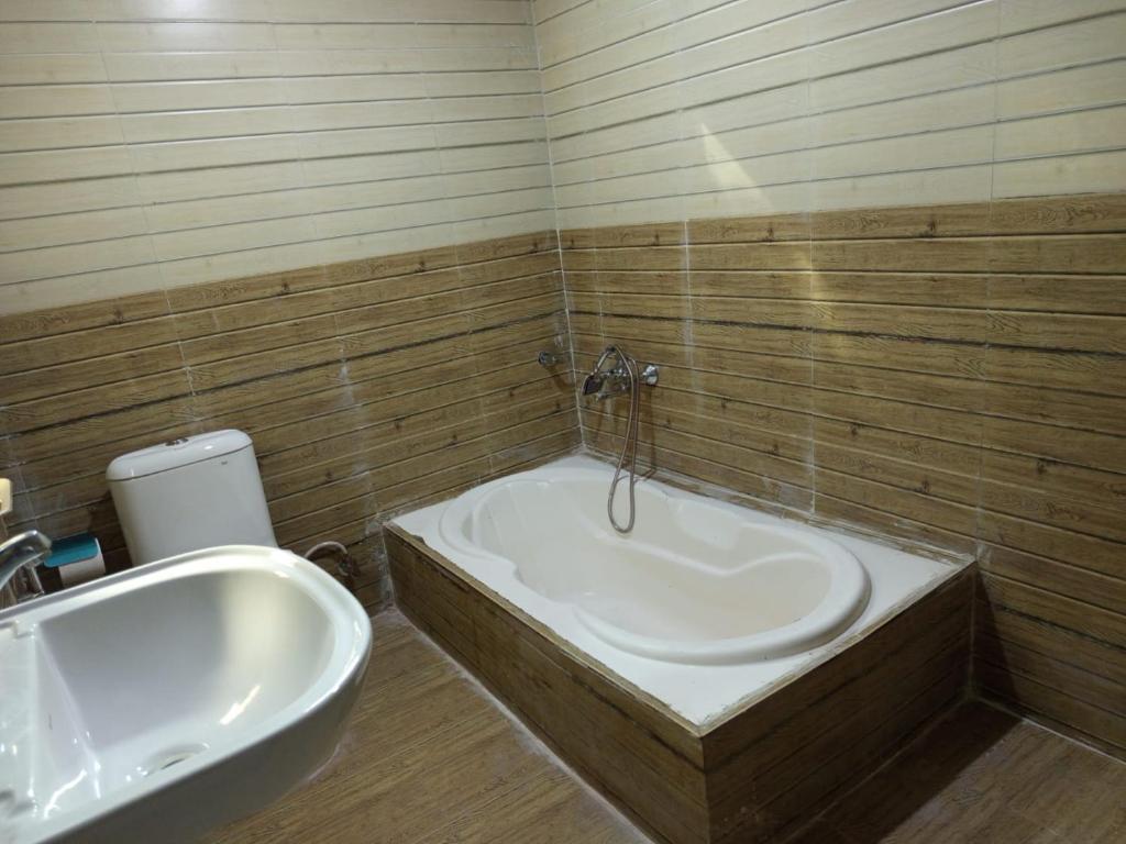 A bathroom at Hotel Dev Inn