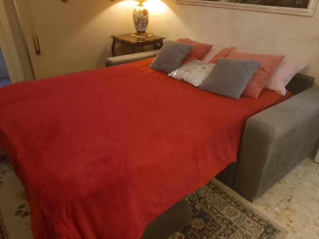 Łóżko lub łóżka w pokoju w obiekcie Casa Bella