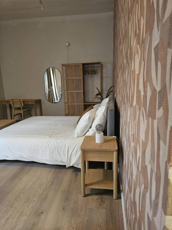 Postel nebo postele na pokoji v ubytování Tropical Oasis Hôtel