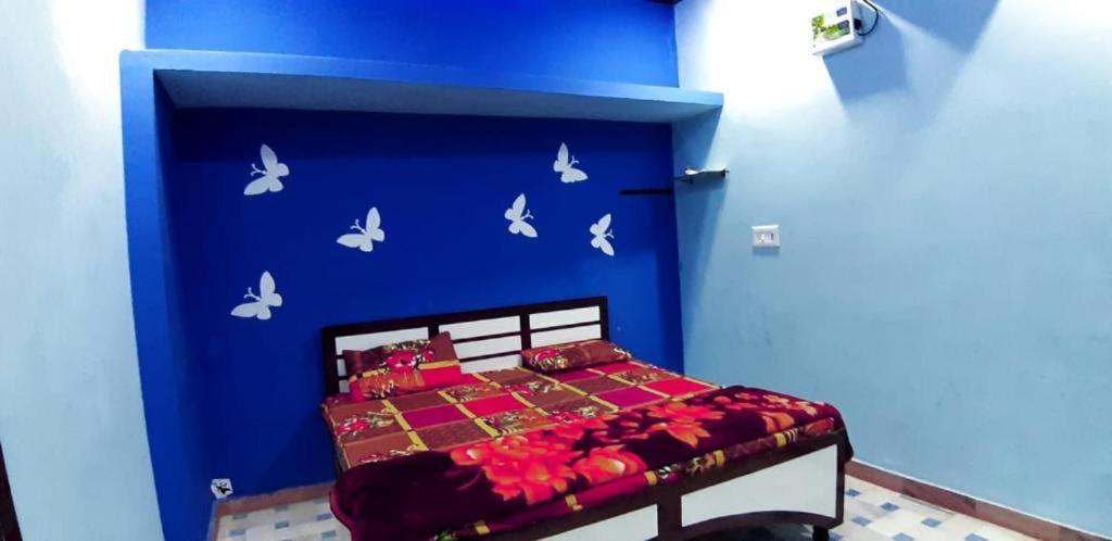 Postel nebo postele na pokoji v ubytování Blue Eye Backpackers Hostel