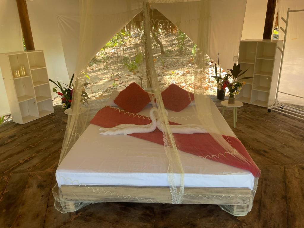Postel nebo postele na pokoji v ubytování Harmony Estate