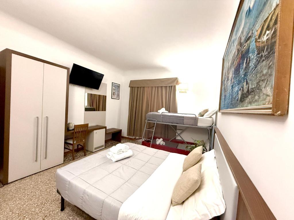 Ліжко або ліжка в номері Grand Gaeta