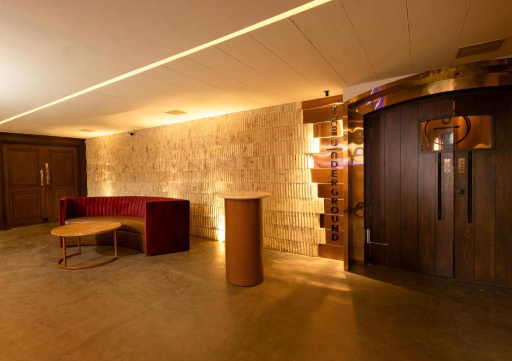 Postel nebo postele na pokoji v ubytování Jenneys Residency