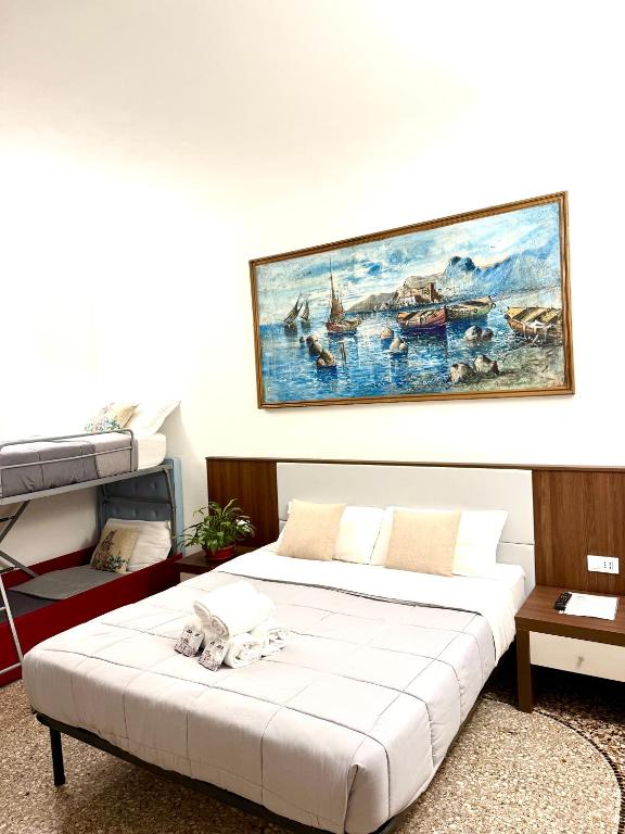 Ліжко або ліжка в номері Grand Gaeta
