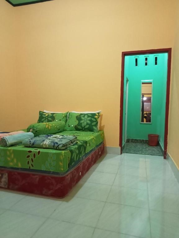 Postel nebo postele na pokoji v ubytování Zinzi's All-Inclusive Homestay