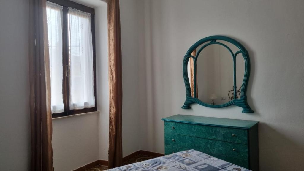 Postel nebo postele na pokoji v ubytování Casa Ombrina