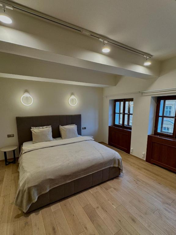 Postel nebo postele na pokoji v ubytování Hotel U 3 Pstrosu