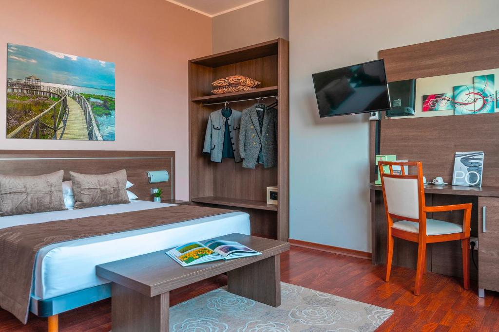 Postel nebo postele na pokoji v ubytování Hotel Formula Int. & Puravita SPA