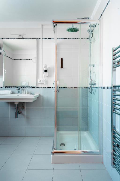 Koupelna v ubytování Hotel Formula Int. & Puravita SPA