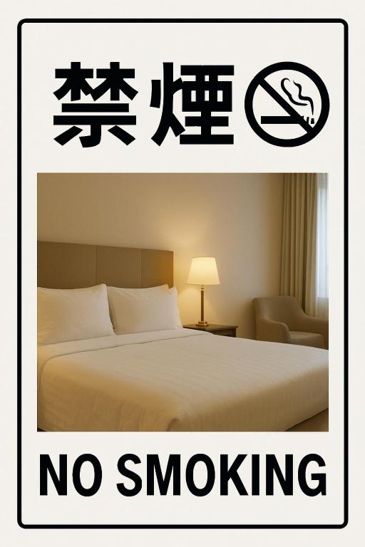Postel nebo postele na pokoji v ubytování Hotel TEMARI Matsumoto