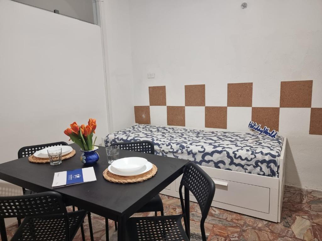 Postel nebo postele na pokoji v ubytování Borgo Di Taormina Apartments by Holiday World