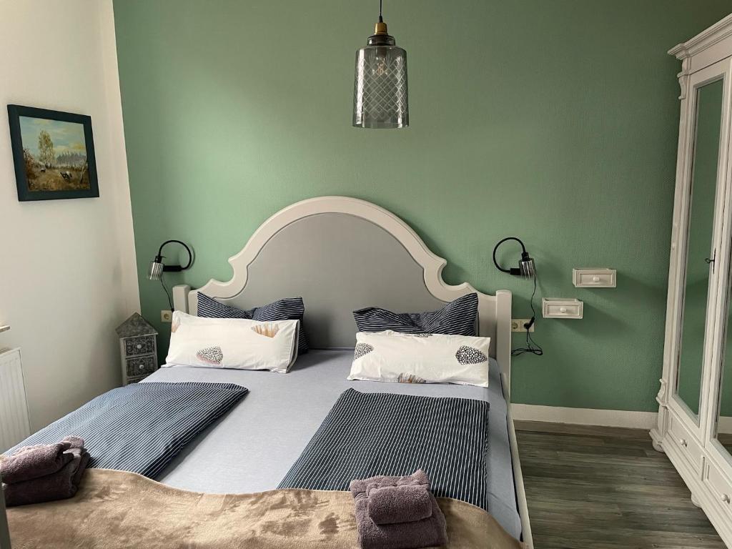 Postel nebo postele na pokoji v ubytování Aparthotel Domizil