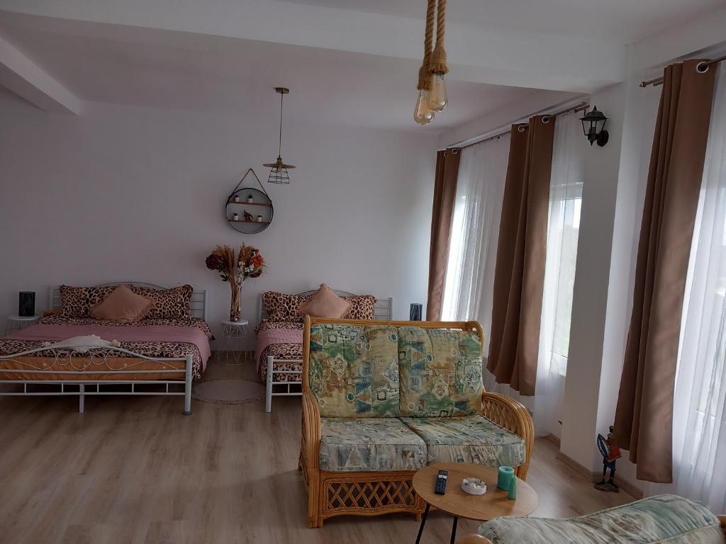 Postel nebo postele na pokoji v ubytování Tina Guest House