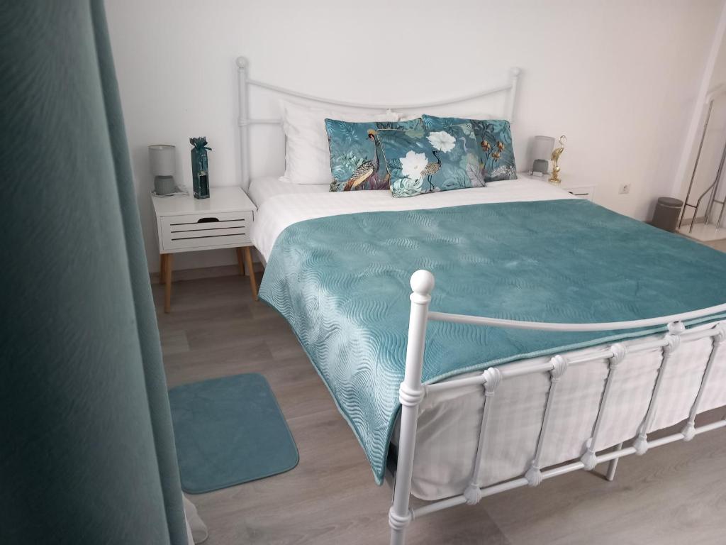 Postel nebo postele na pokoji v ubytování Tina Guest House
